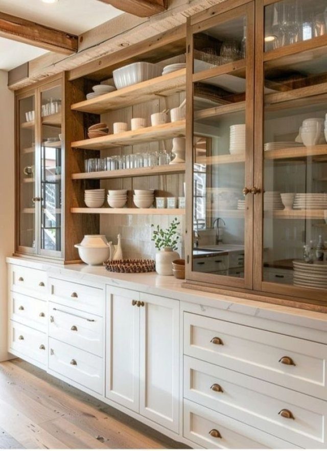 Kitchen Wood Pantry: 40 Ideas with Glass, Drawers, and Doors 35 White lower cabinets and natural wood open shelving with glass-front pantry cabinets.